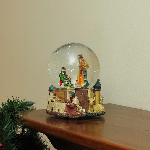 5.5" Nativity Scene Religious Musical Christmas Snow Globe. Picture 3