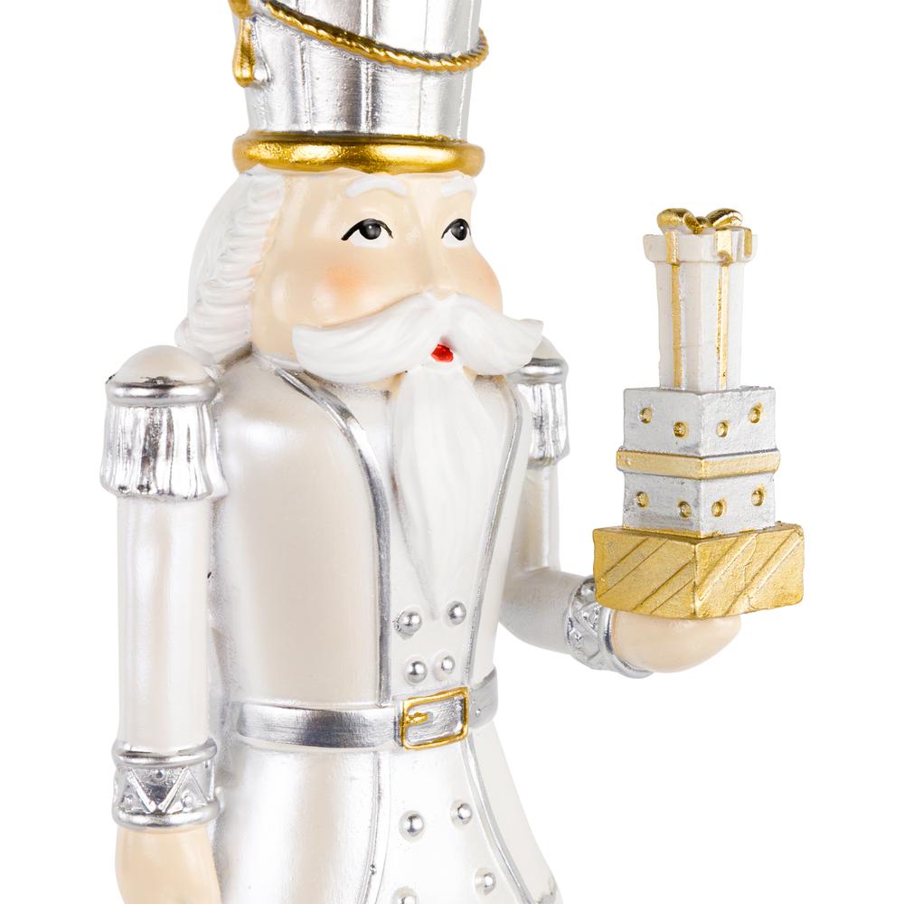 13.5" Gold Metallic Christmas Nutcracker with Gifts. Picture 6