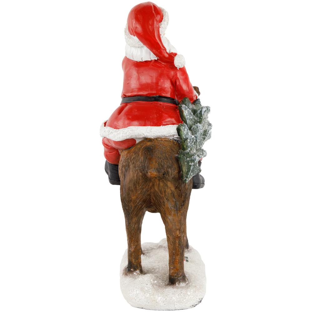 8.25" Santa Claus Rides a Reindeer Christmas Figurine. Picture 6