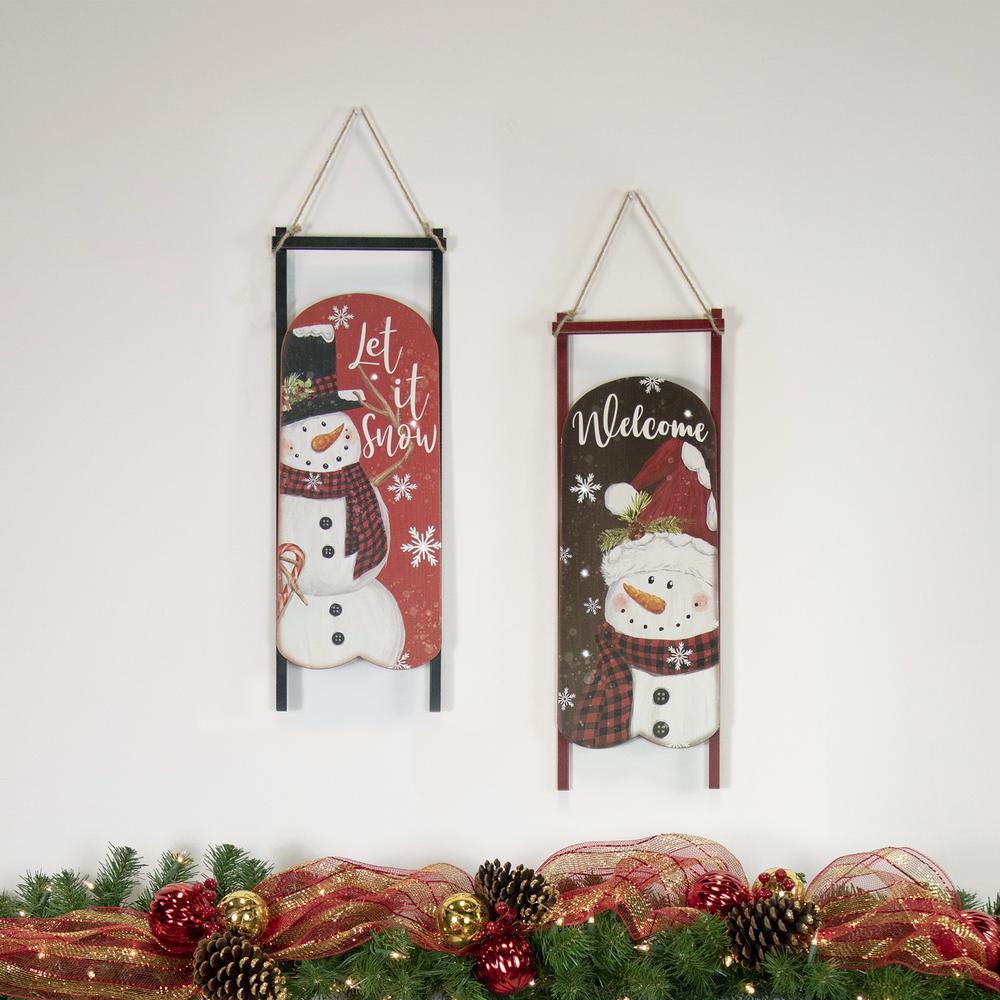 21.75" LED Lighted 'Let it Snow' Snowman Sled Christmas Wall Sign. Picture 2