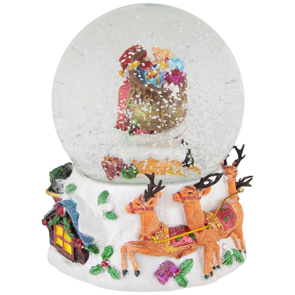 6.5" Santa Delivering Gifts Musical Christmas Snow Globe. Picture 6