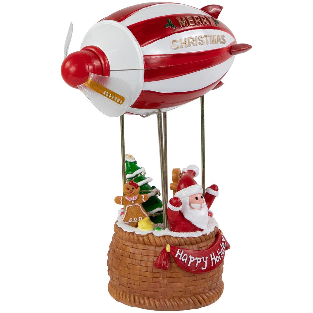 8.5" Red and White Musical and Animated Blimp Christmas Figure. Picture 6