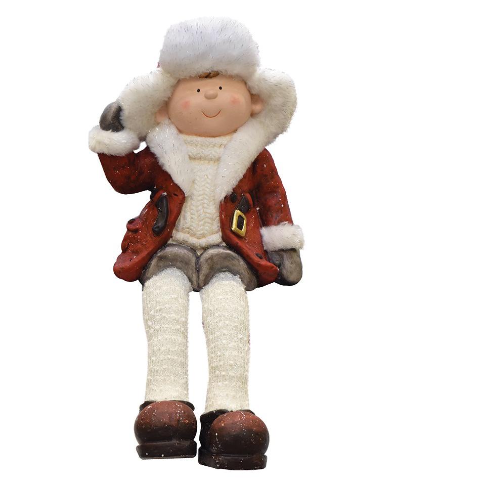 19" White and Red Sitting Young Boy with Trimmed Ski Hat Christmas Figurine. Picture 1