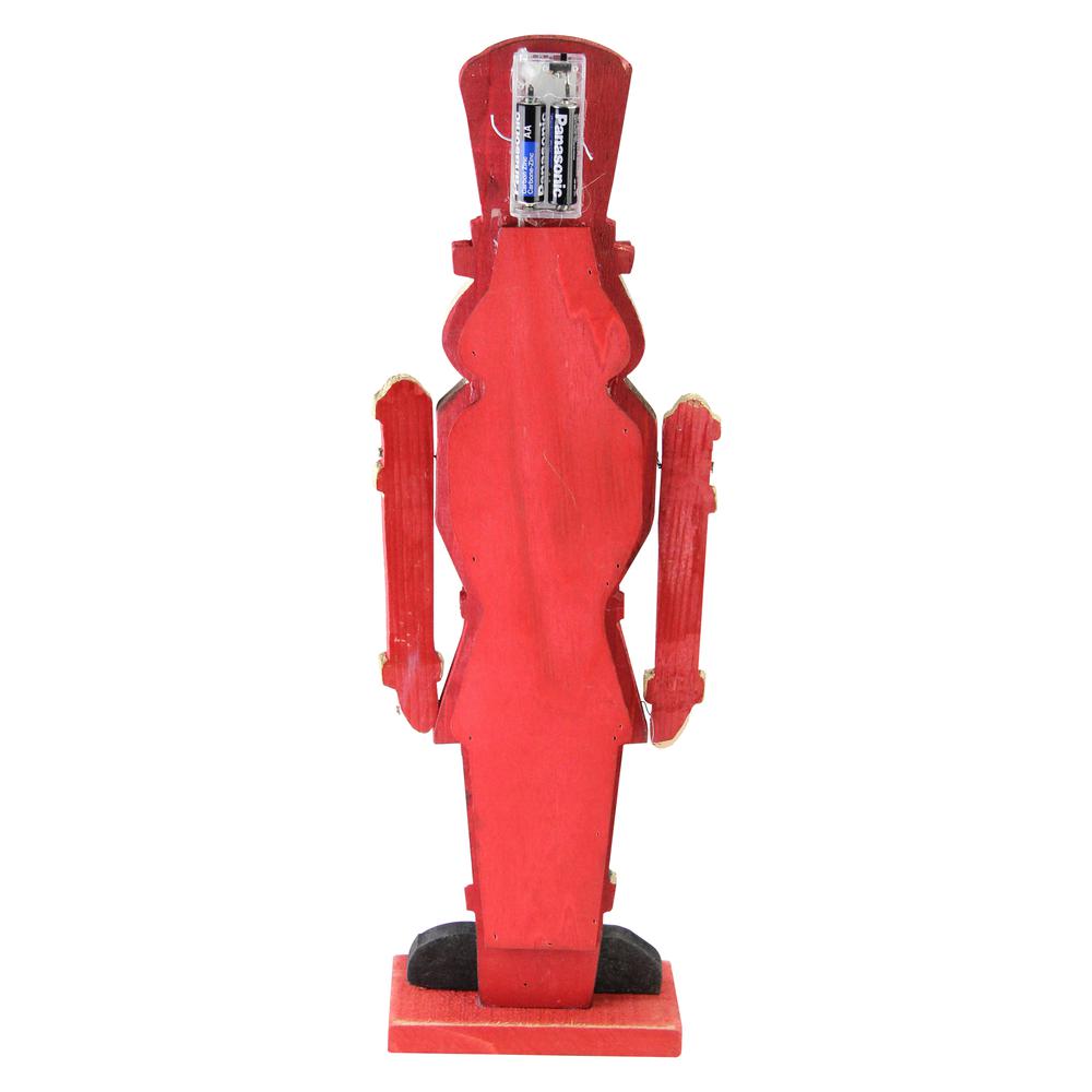 21" Red and Blue Painted Wooden Standing LED Nutcracker. Picture 4
