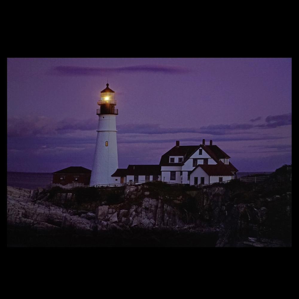 LED Lighted Coastal Lighthouse Home with Sunset Canvas Wall Art 15.75" x 23.5". Picture 2