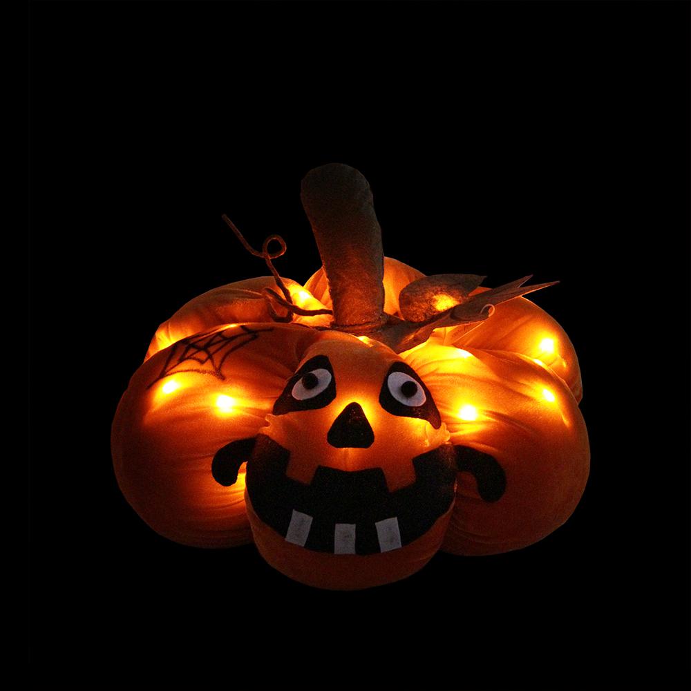 15" Orange LED Lighted Plush Jack-o-Lantern Pumpkin Halloween Decoration. Picture 2