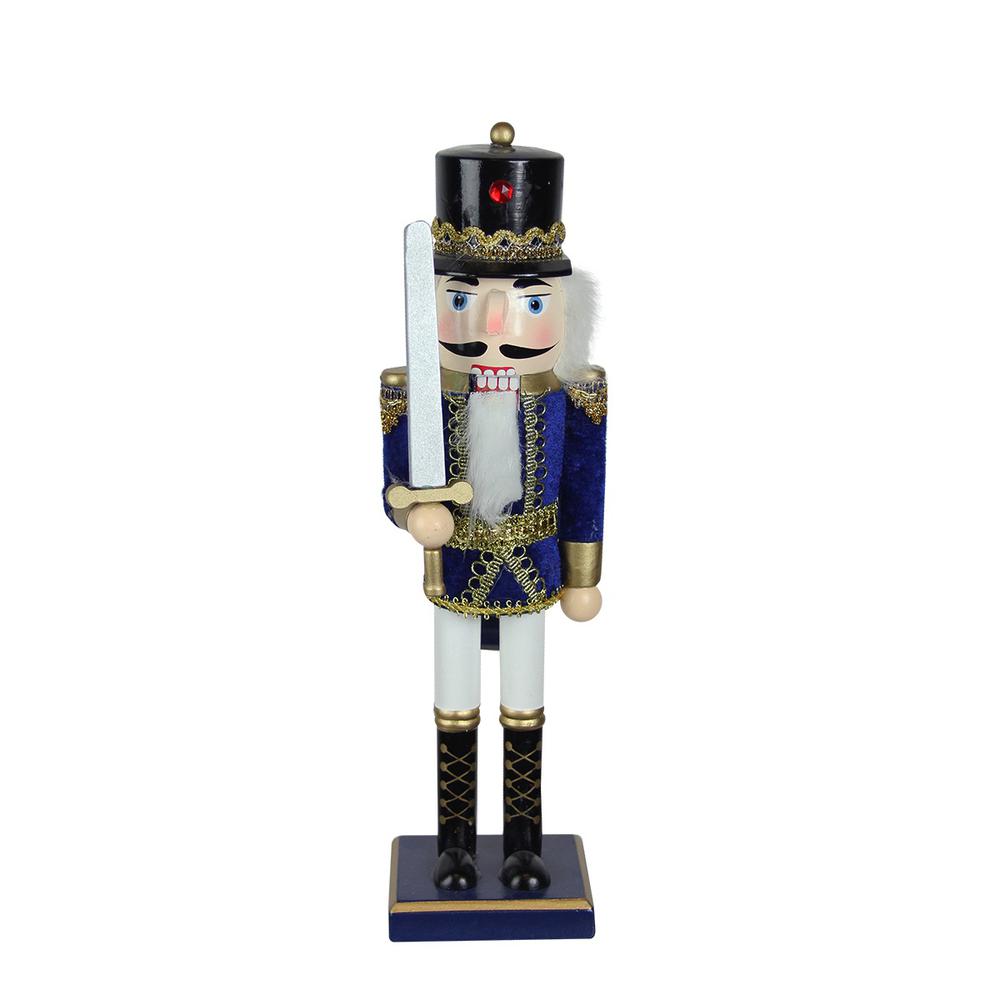 14" Blue and White Christmas Nutcracker Soldier with Sword Tabletop Decor. Picture 1