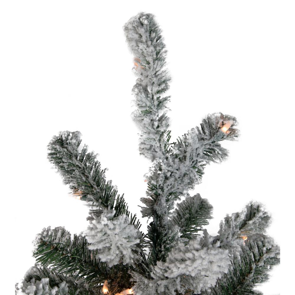 7.5' Pre-Lit Full Flocked Natural Emerald Artificial Christmas Tree - Warm Clear Lights. Picture 2