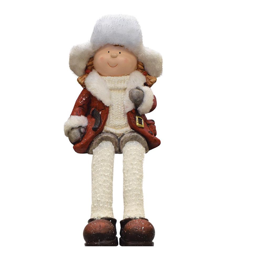 19" White and Red Sitting Young Girl in Trapper Hat Christmas Figurine. Picture 1