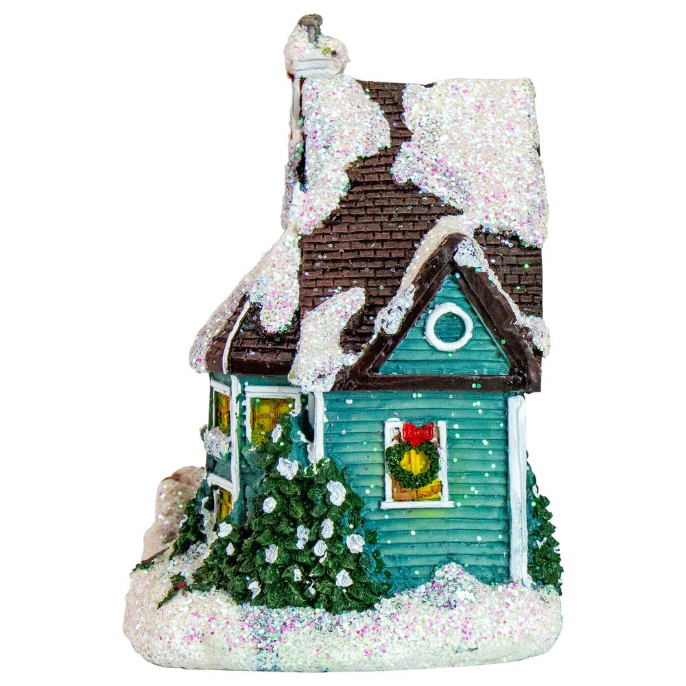 5.5" Green LED Lighted Snowy House Christmas Village Decoration. Picture 2