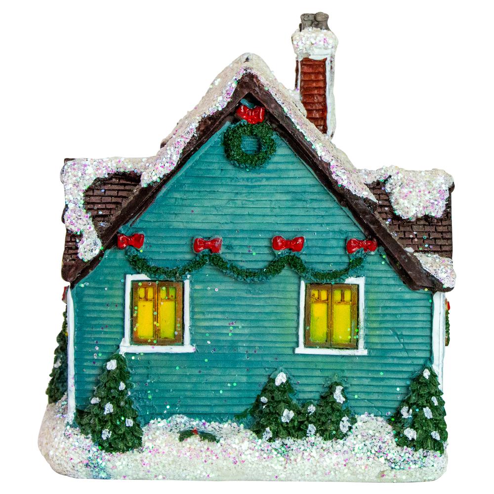 5.5" Green LED Lighted Snowy House Christmas Village Decoration. Picture 3