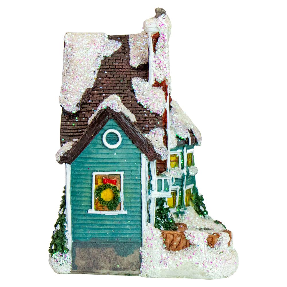 5.5" Green LED Lighted Snowy House Christmas Village Decoration. Picture 4