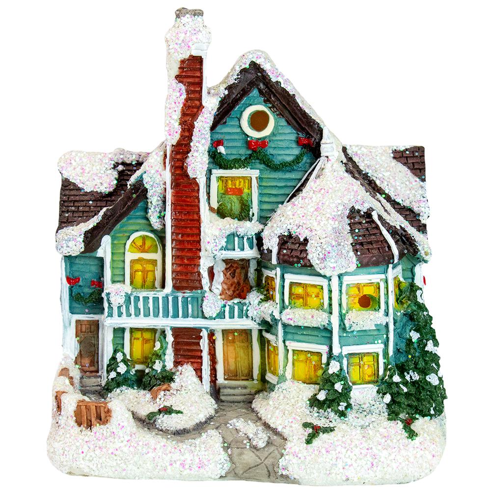 5.5" Green LED Lighted Snowy House Christmas Village Decoration. Picture 1