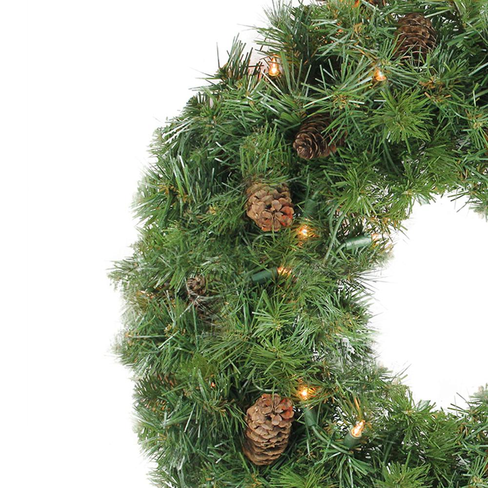 Pre-Lit Dakota Pine Artificial Christmas Wreath - 24-Inch  Clear Lights. Picture 1