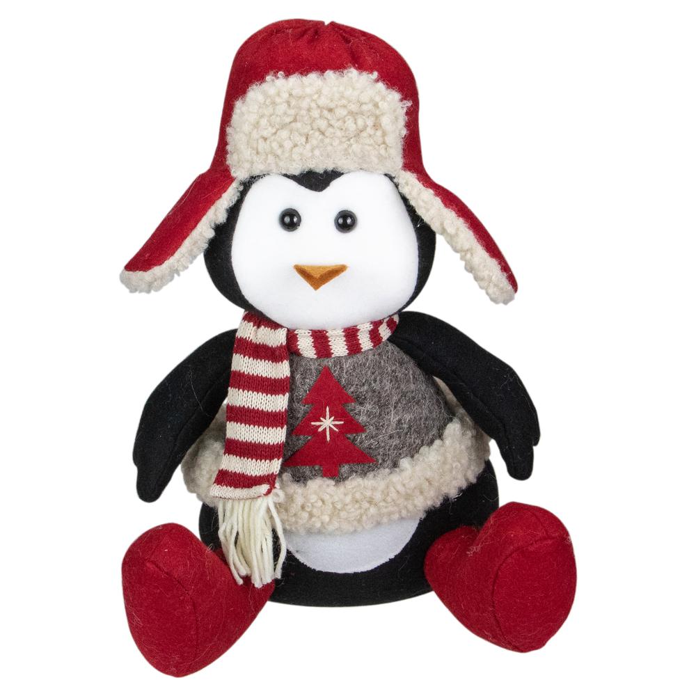 12" Red  White  and Gray Sitting Winter Penguin Christmas Tabletop Decoration. Picture 1
