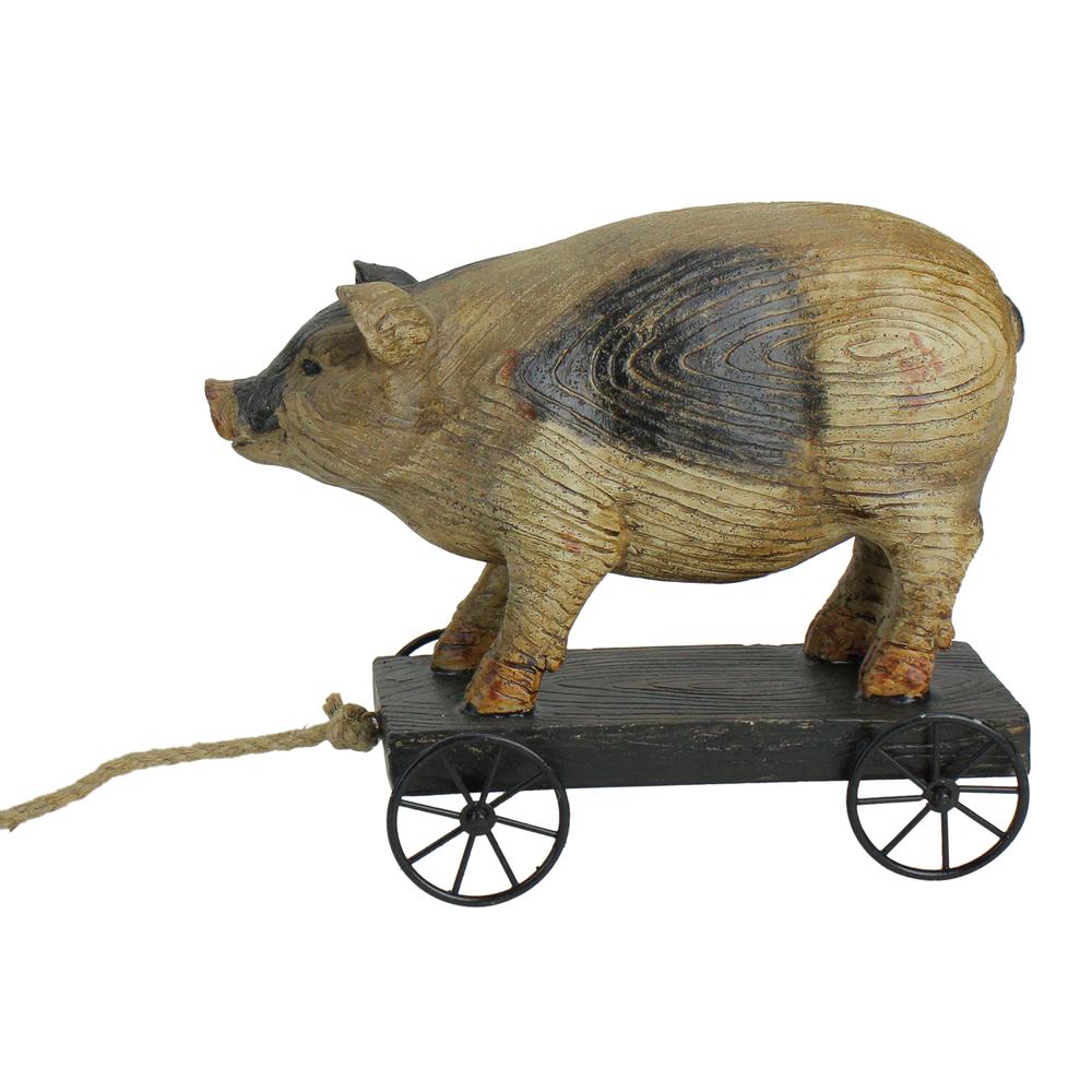 10" Black and White Wood Textured Pig on Cart Outdoor Garden Statue. Picture 1