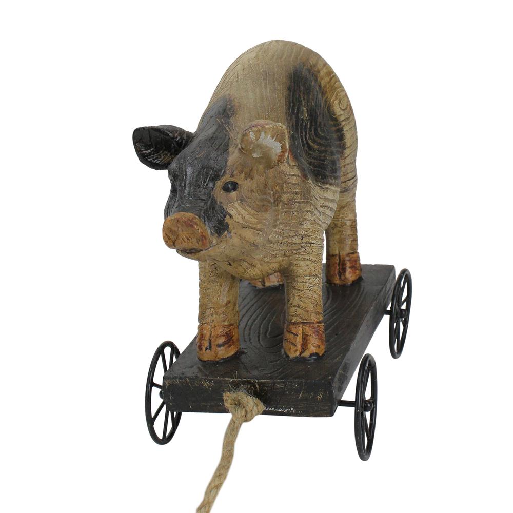 10" Black and White Wood Textured Pig on Cart Outdoor Garden Statue. Picture 2