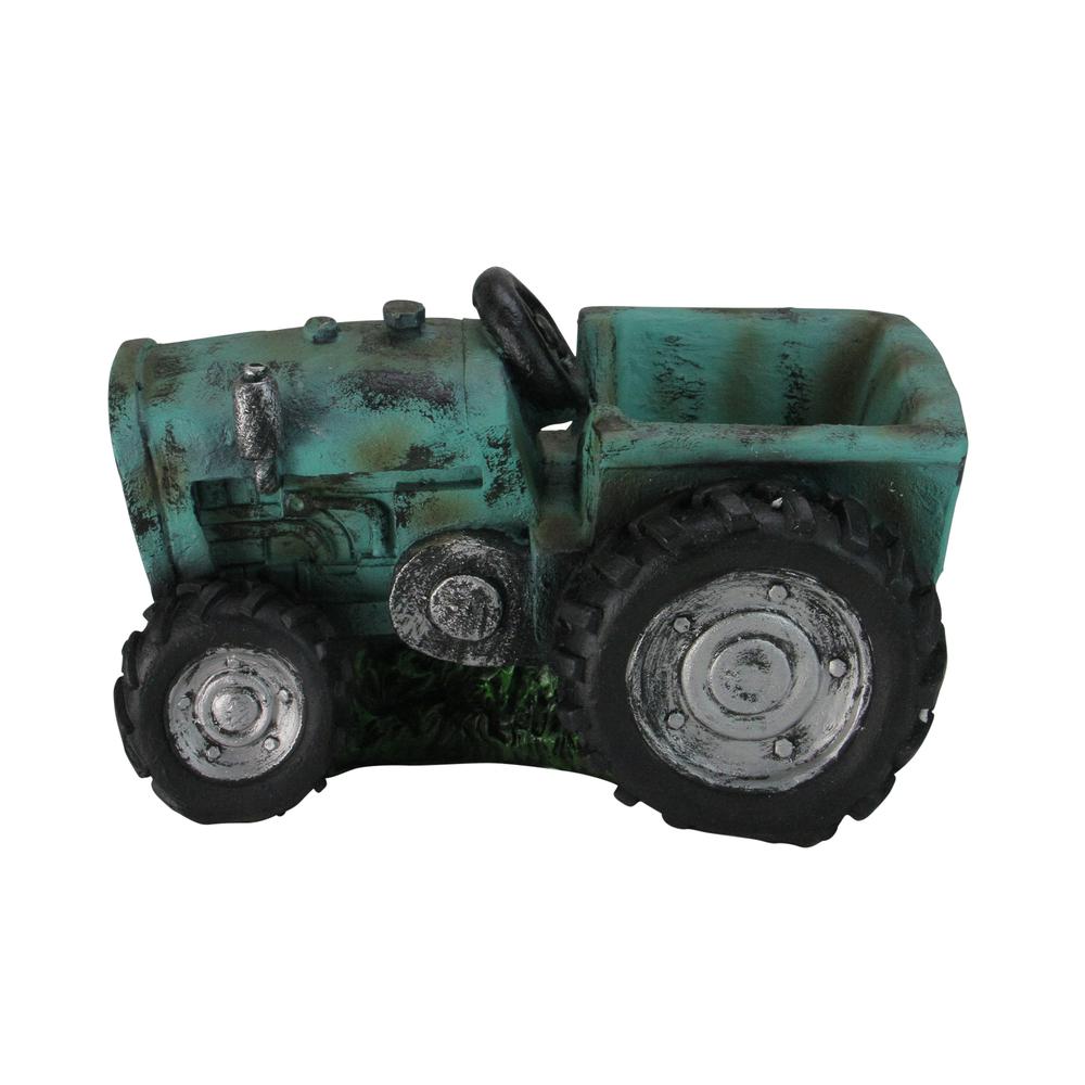 12.25" Green and Black Distressed Tractor Garden Patio Planter. Picture 1