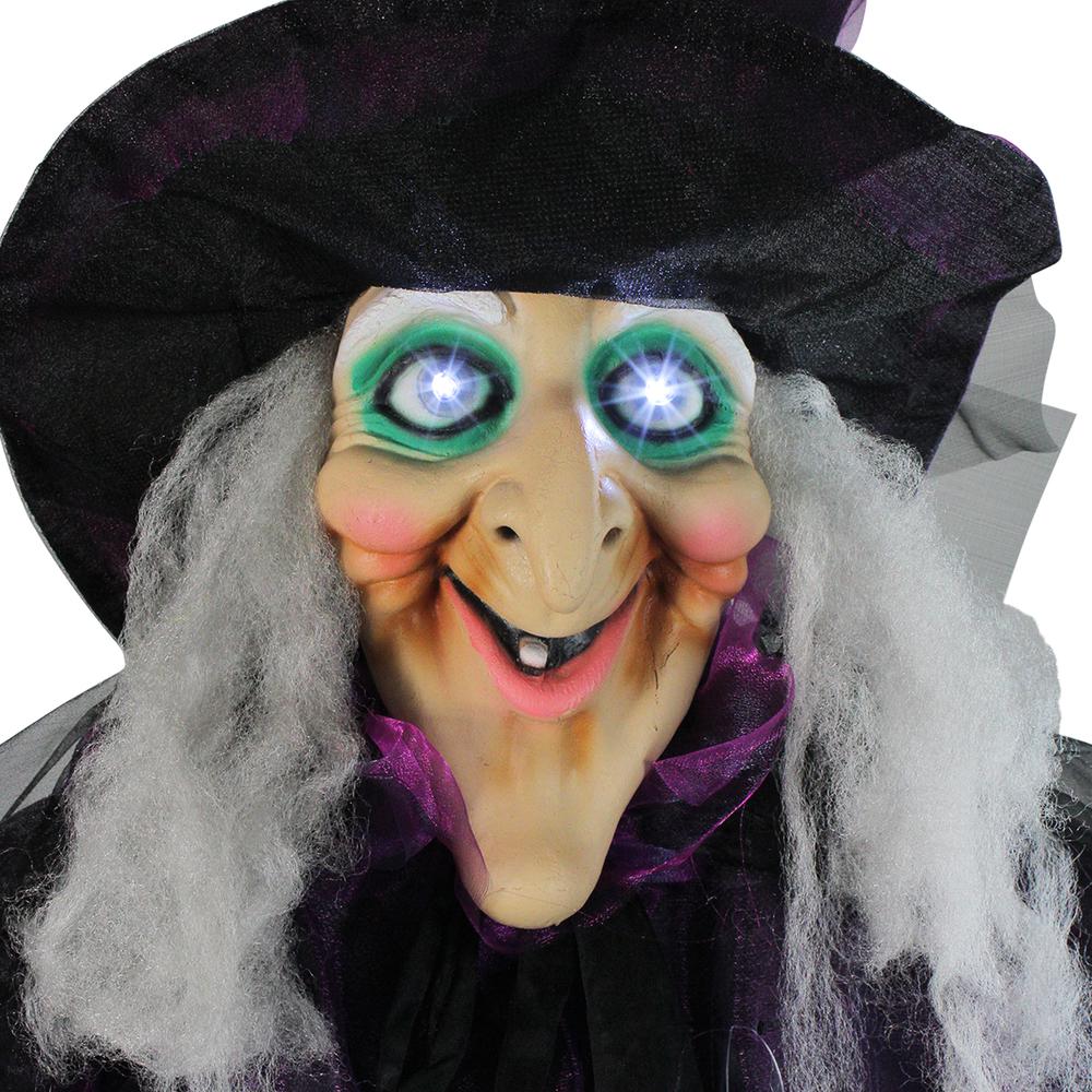 66" Animated Standing Witch and Broomstick Halloween Decoration. Picture 3
