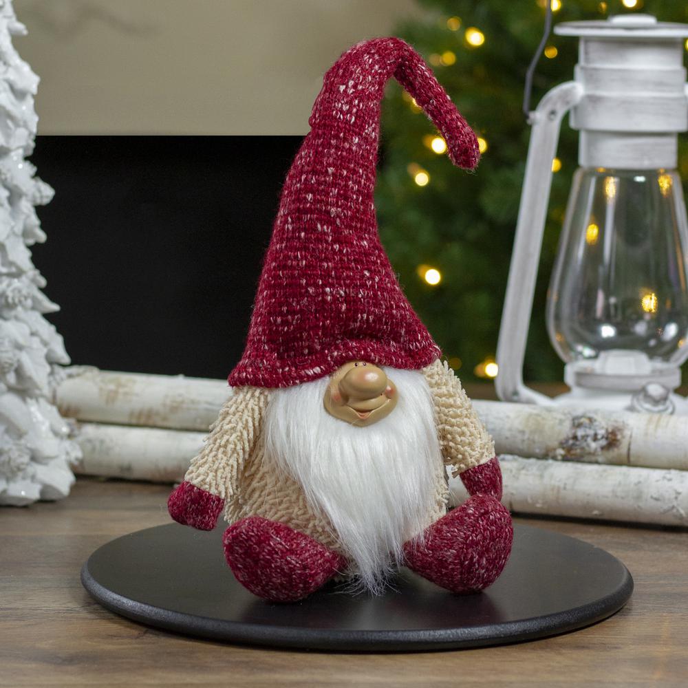 17" Ivory and Red Chubby Smiling Gnome Plush Tabletop Christmas Decoration. Picture 2