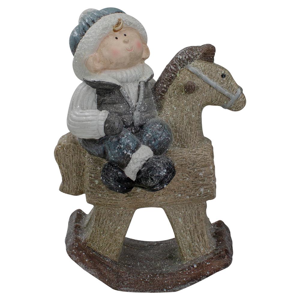 18" Boy on Rocking Horse Christmas Tabletop Figure. The main picture.