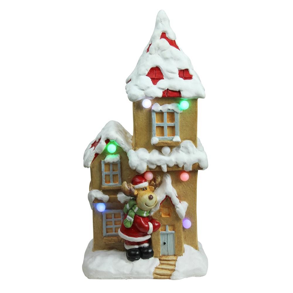 21.25" White and Brown Pre-Lit LED House with Reindeer Santa Musical Christmas Tabletop Decor. Picture 1