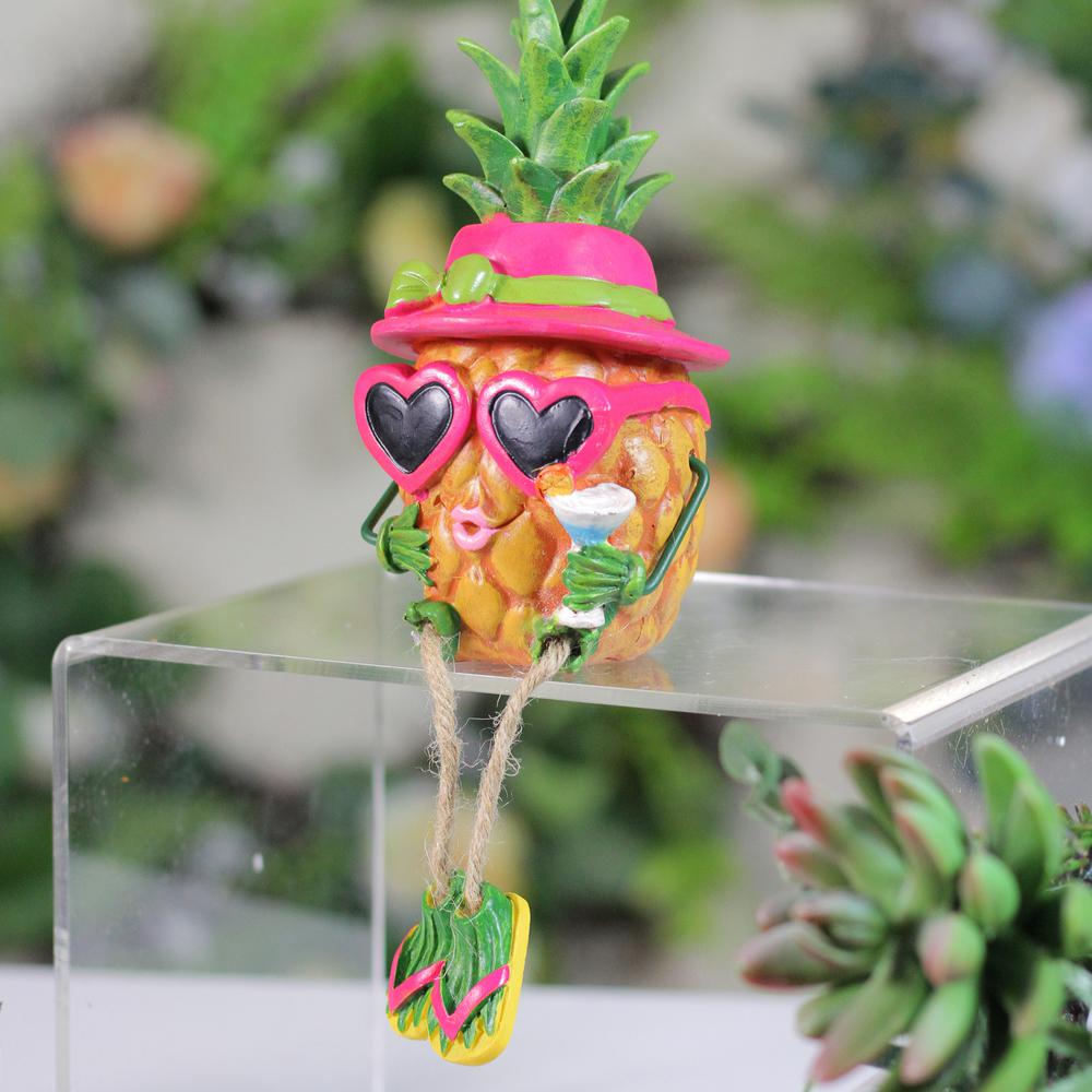 10" Tropical Pineapple Girl Figure with Cocktail and Dangling Legs. Picture 3