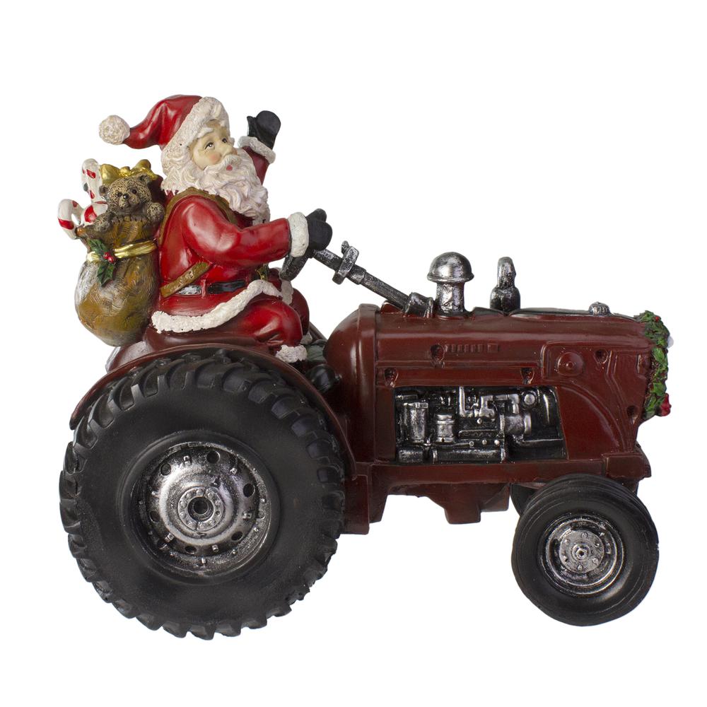 11" Rustic Santa Claus on Tractor Tabletop Christmas Figure. Picture 1