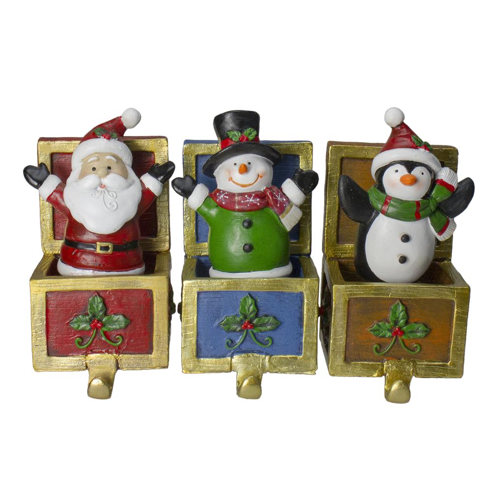 Set of 3 Santa  Snowman and Penguin Jack in the Box Christmas Stocking Holders. Picture 1