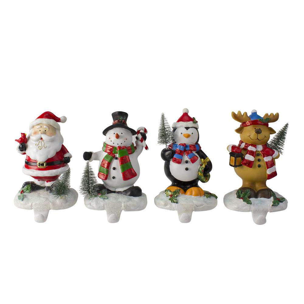 Set of 4 Santa  Snowman  Penguin and Reindeer Christmas Stocking Holders 5.75". Picture 1
