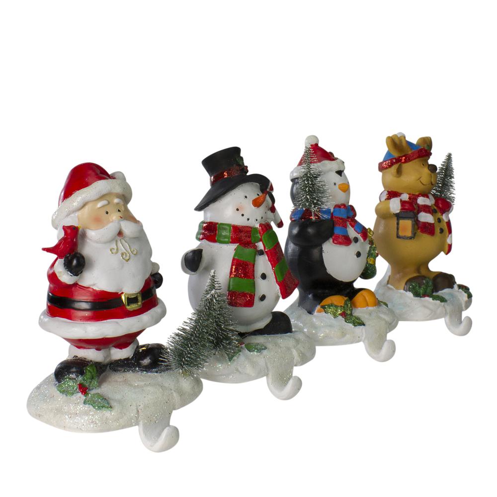 Set of 4 Santa  Snowman  Penguin and Reindeer Christmas Stocking Holders 5.75". Picture 3