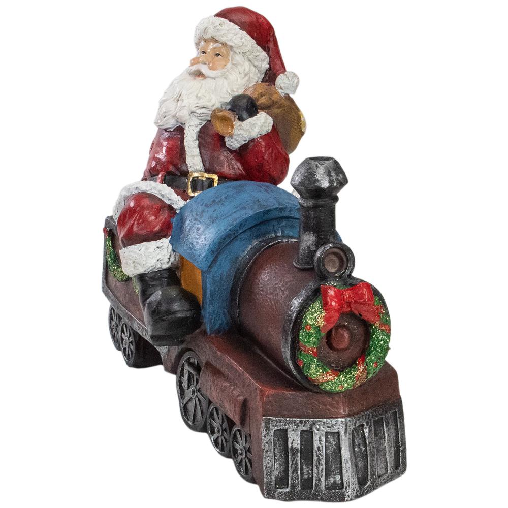 14" Red and Blue Santa on a Train Christmas Tabletop Decoration. Picture 2