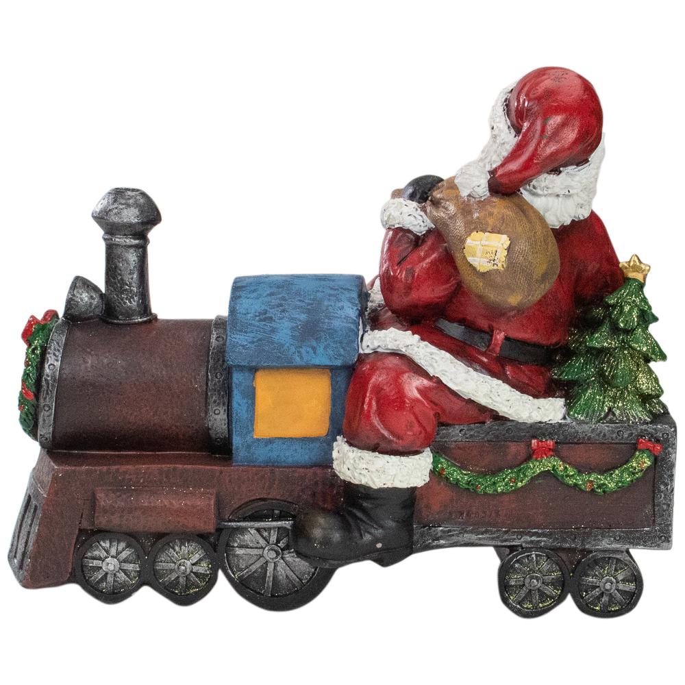 14" Red and Blue Santa on a Train Christmas Tabletop Decoration. Picture 3