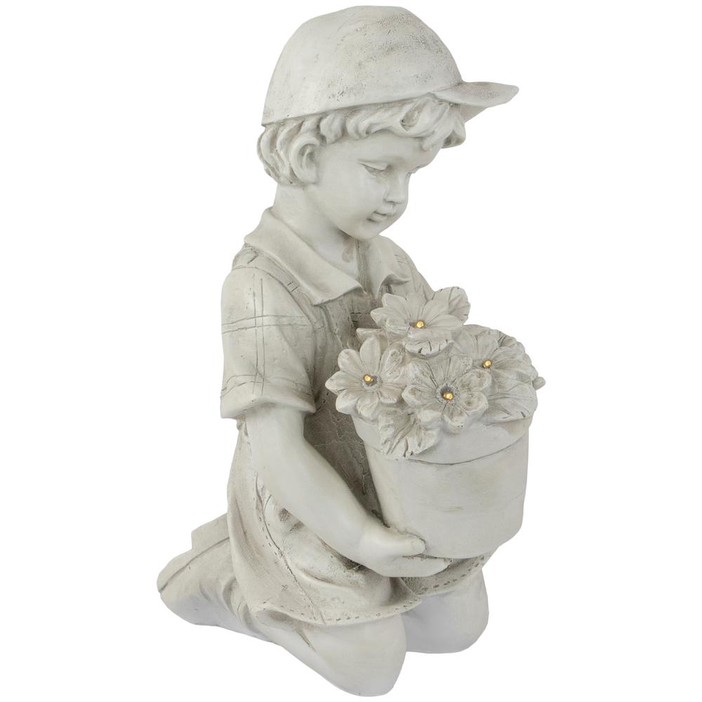 15" Solar LED Lighted Boy with Flowers Outdoor Garden Statue. Picture 3