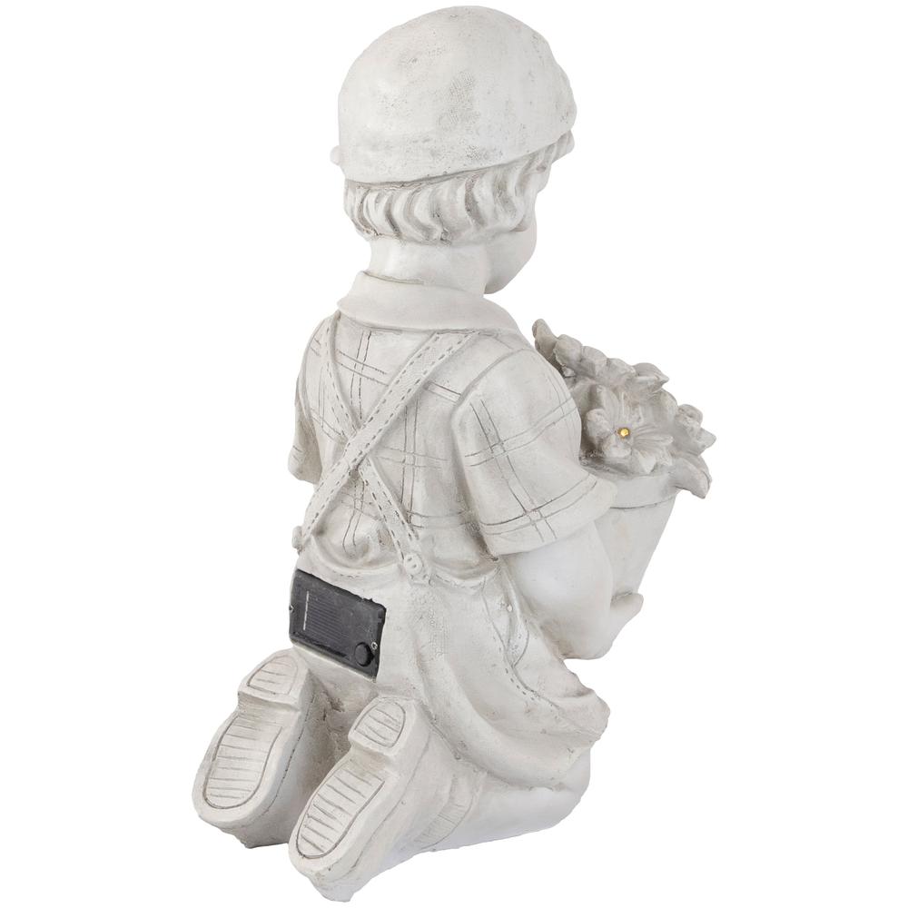 15" Solar LED Lighted Boy with Flowers Outdoor Garden Statue. Picture 5