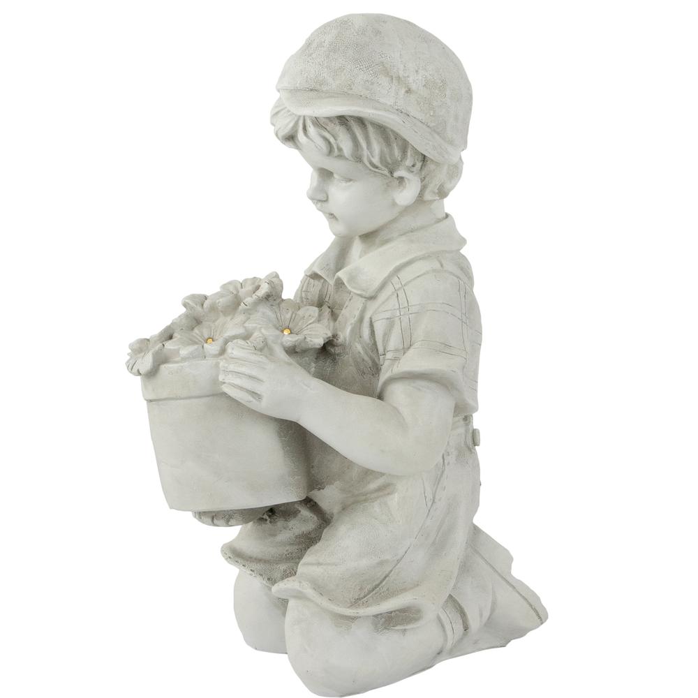 15" Solar LED Lighted Boy with Flowers Outdoor Garden Statue. Picture 4