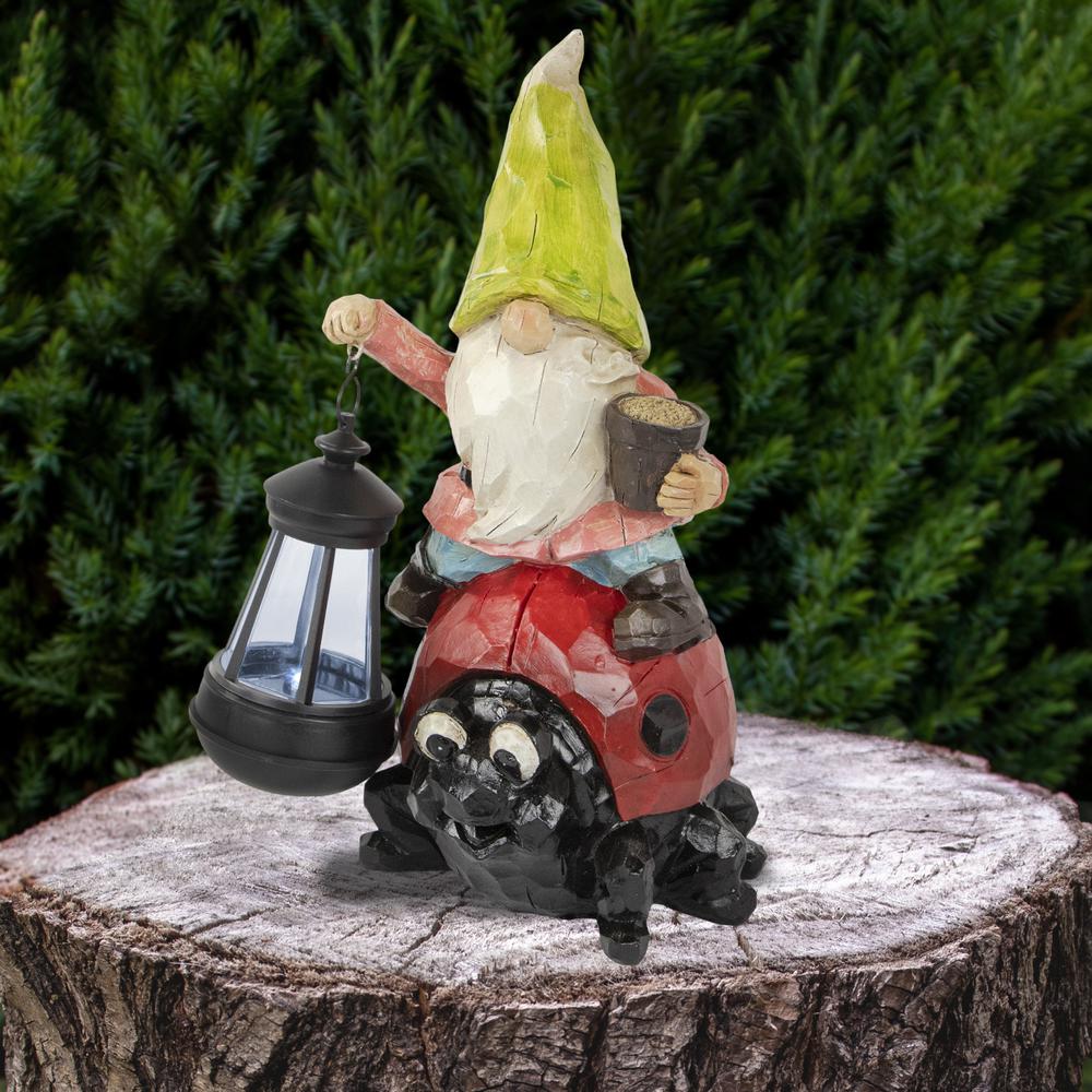 12.25" Solar LED Lighted Gnome and Ladybug Outdoor Garden Statue. Picture 2