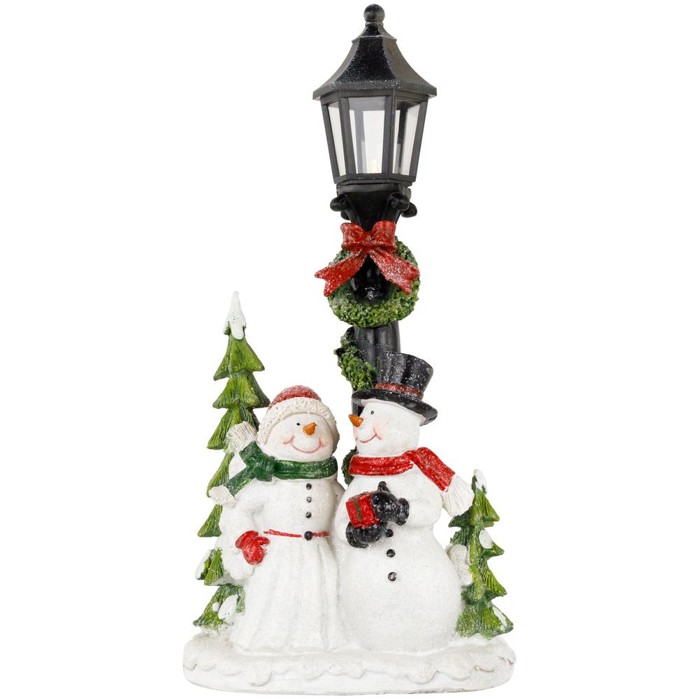 13.75" Lighted Snow Couple Under Street Lamp Christmas Figure. Picture 1