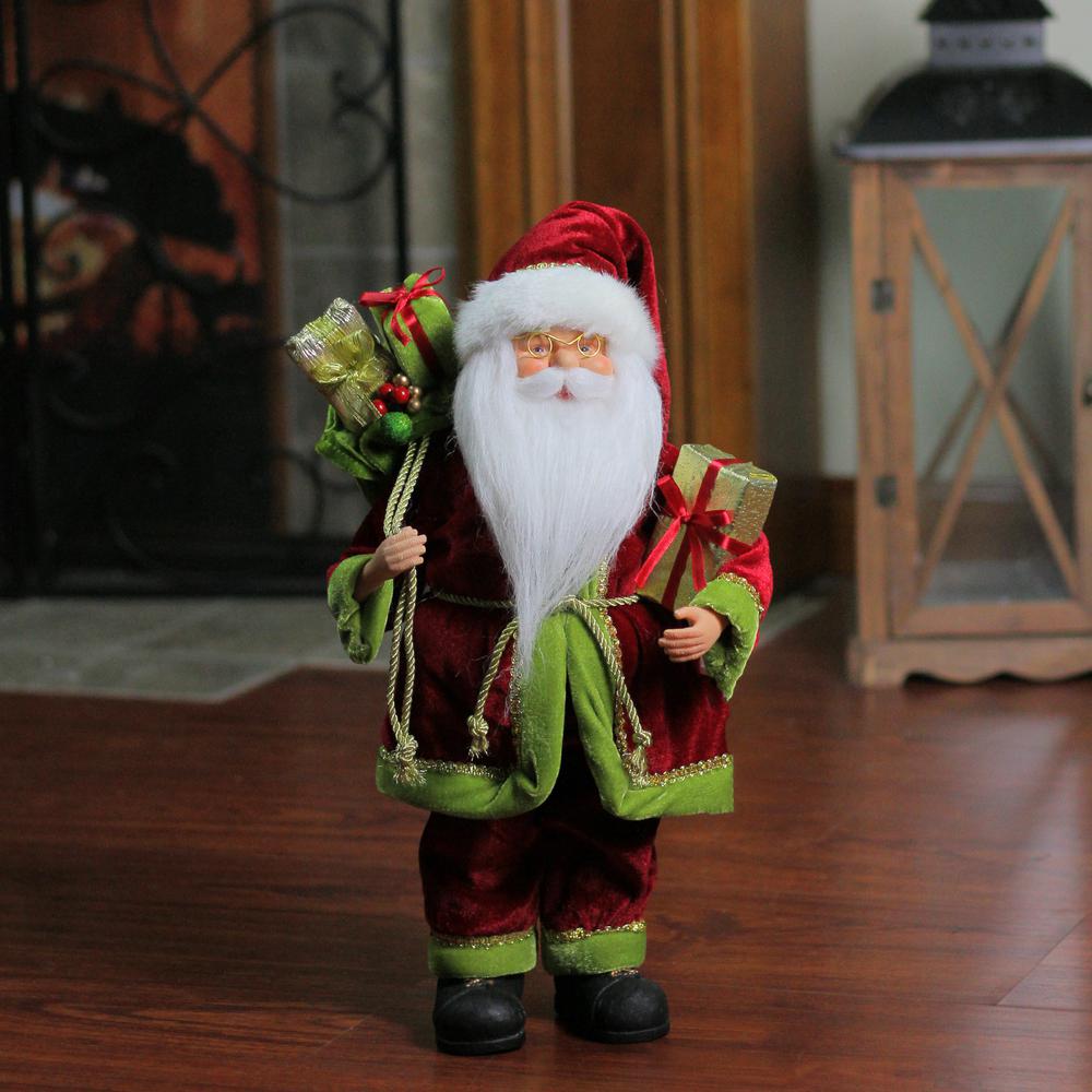 16" Red and Green Grand Imperial Santa Claus with Gift Bag Christmas Tabletop Figurine. Picture 3