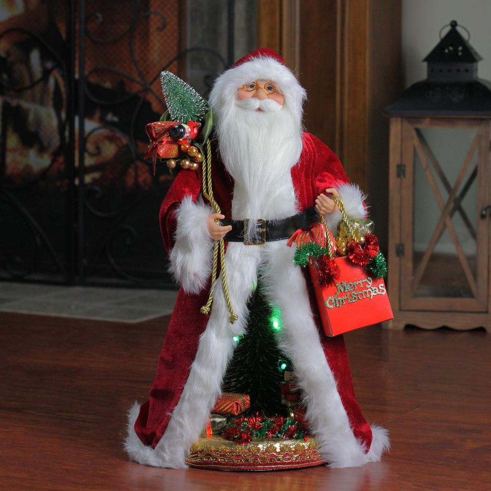 20" Red and White Battery Operated Musical Standing Santa Claus with LED Lighted Christmas Scene Figurine. Picture 3