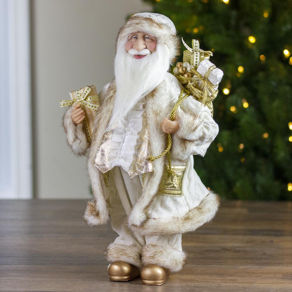 18" Ivory and Gold Santa Claus with Gift Bag Christmas Figure. Picture 2