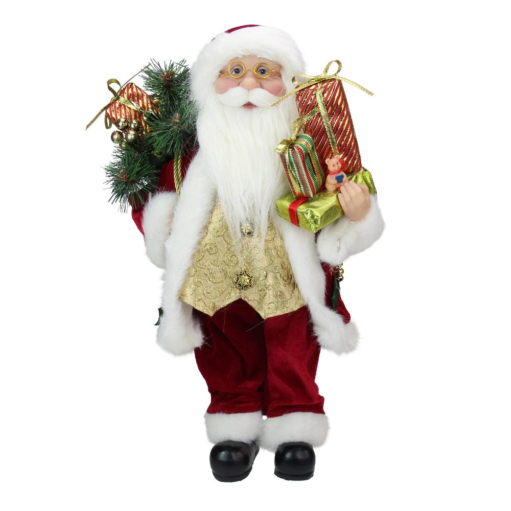 16" Red and White Traditional Holly Berry Standing Santa Claus Christmas Figure with Gift Bag. Picture 1