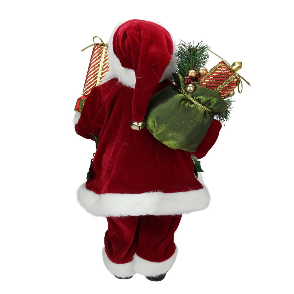 16" Red and White Traditional Holly Berry Standing Santa Claus Christmas Figure with Gift Bag. Picture 5
