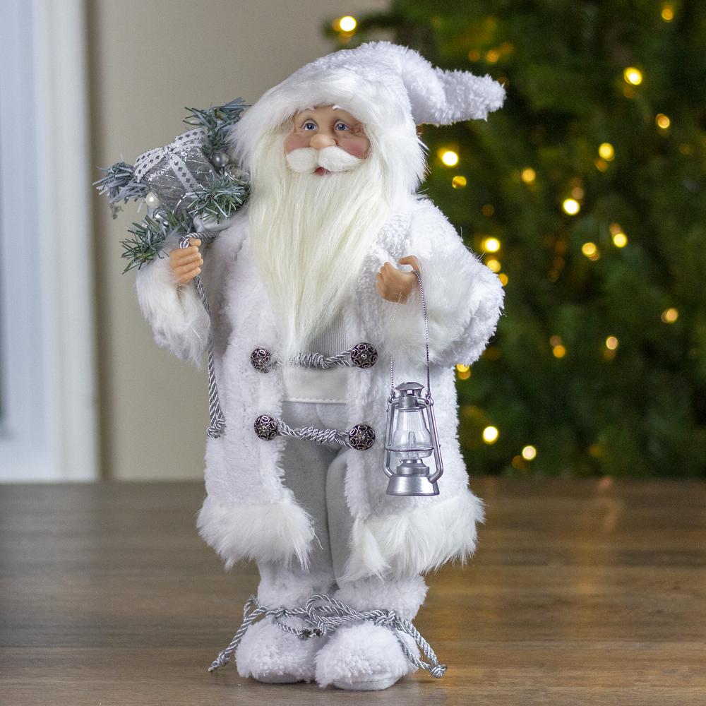 16" White Frost Standing Santa Claus Christmas Figurine with Lantern. Picture 5