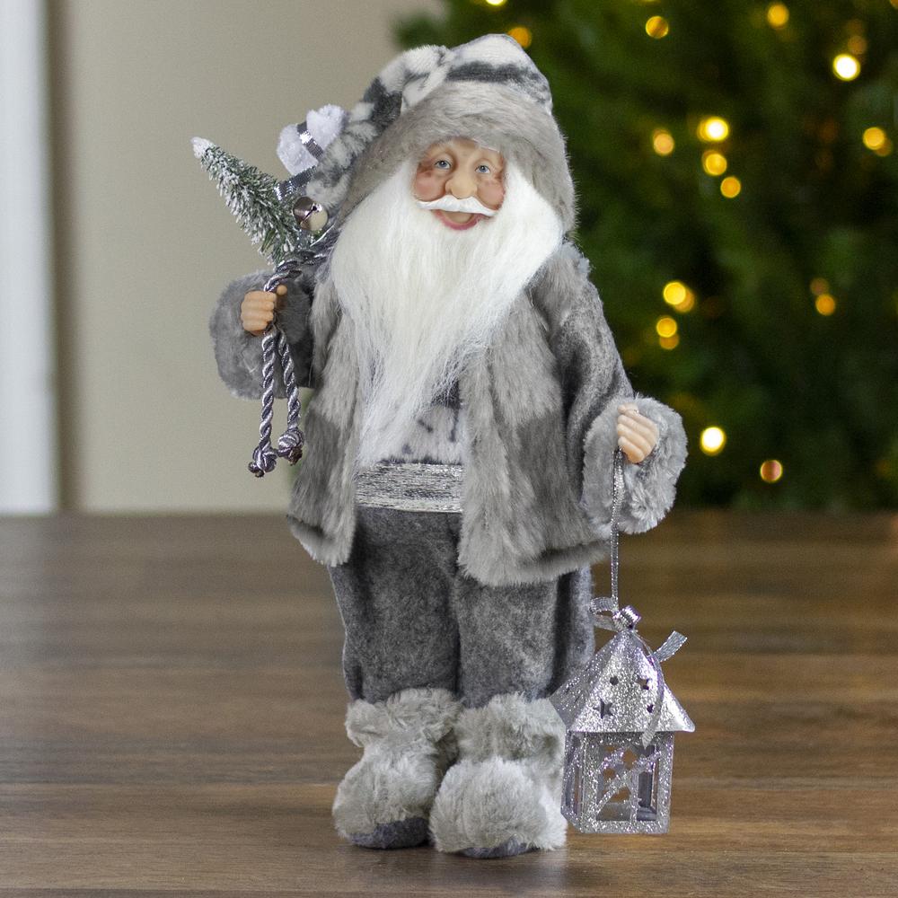 12" Gray and White Standing Santa Claus Christmas Figurine with Bag and Lantern. Picture 2