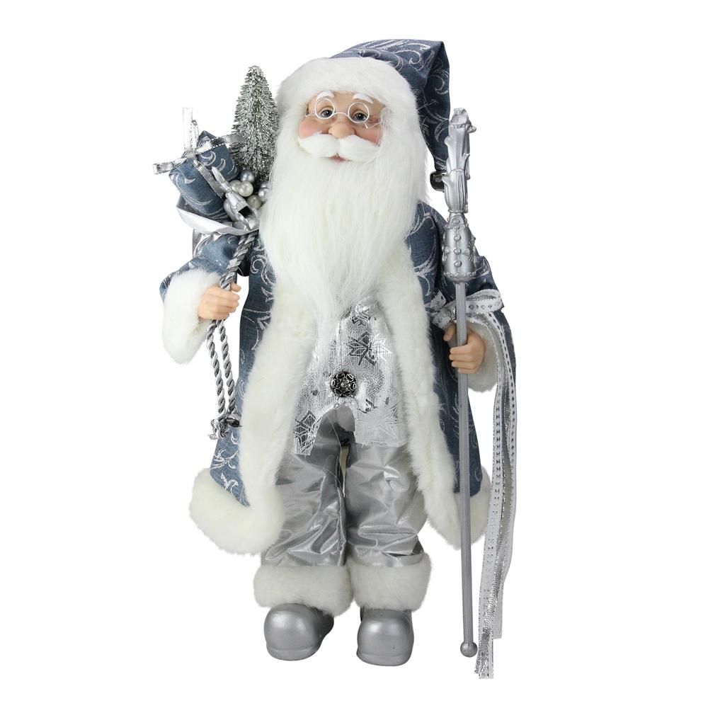 16" Ice Palace Standing Santa Claus Holding A Staff and Bag Christmas Figure. Picture 1