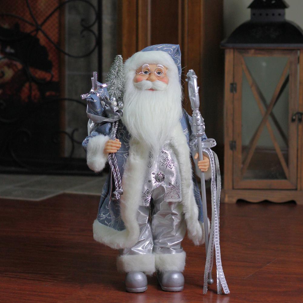 16" Ice Palace Standing Santa Claus Holding A Staff and Bag Christmas Figure. Picture 3