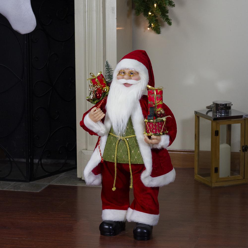 24" Red and White Santa Claus with Presents and Drum Christmas Figure. Picture 5
