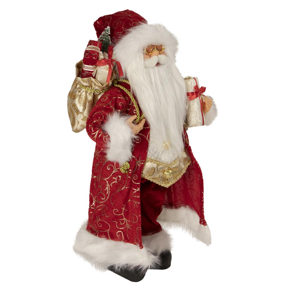 16" Red and Gold Filigree Santa Claus with Gifts Christmas Figurine. Picture 3