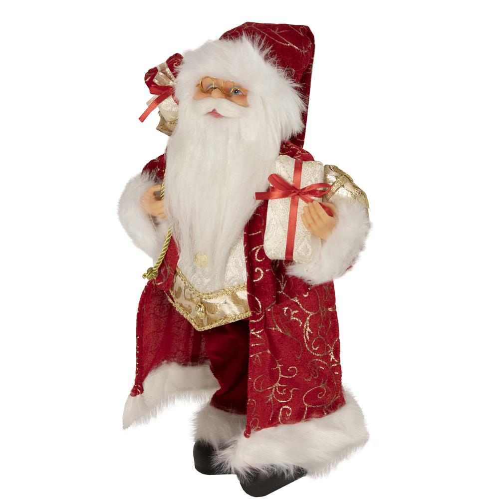 16" Red and Gold Filigree Santa Claus with Gifts Christmas Figurine. Picture 4